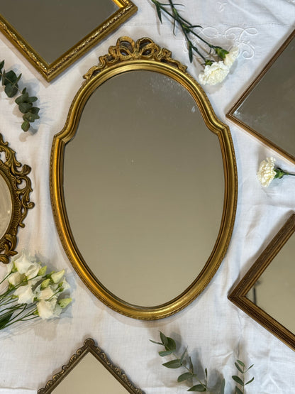 Miroir vintage doré en bois