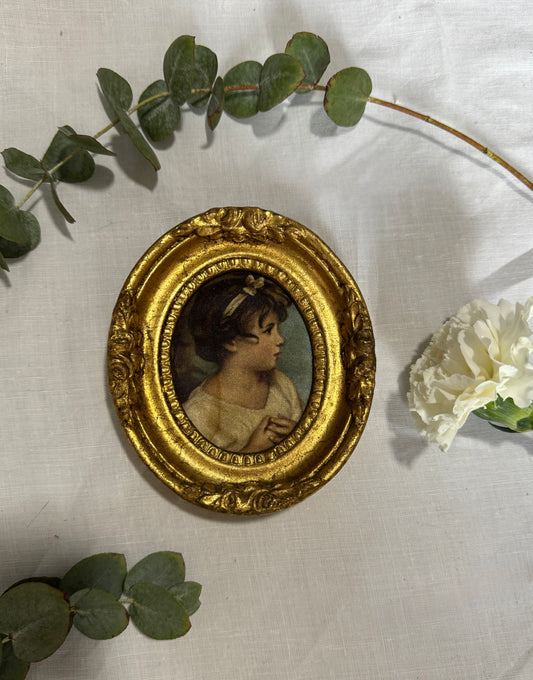 Cadre ovale doré vintage