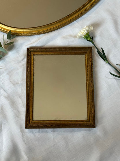 Miroir vintage doré en bois
