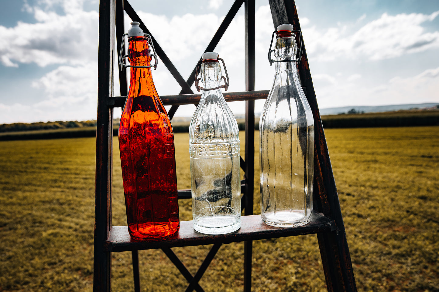 Lot de 3 bouteilles en verre anciennes